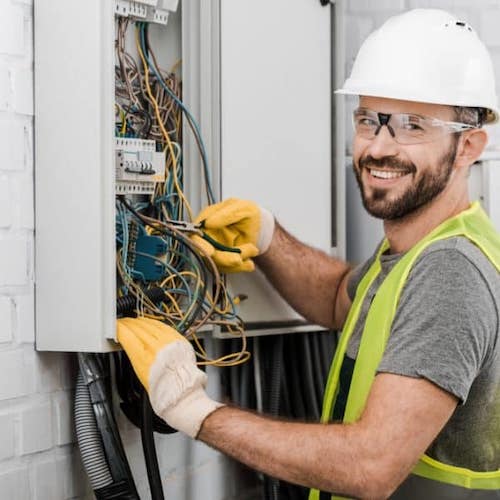 Electrician working on fuse box with RCD protection in Doncaster